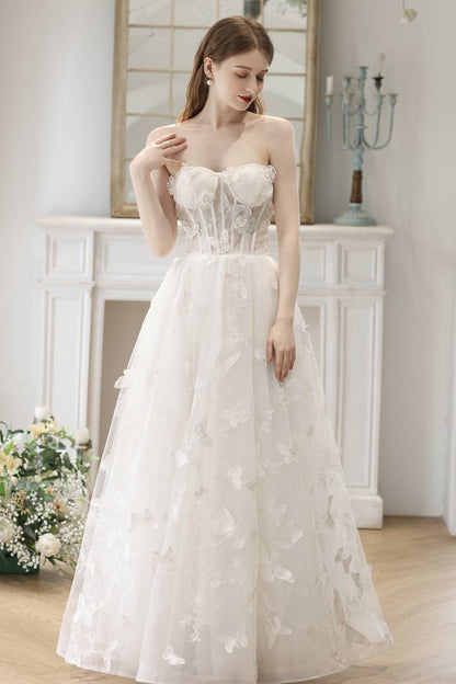 Robe longue corset évasée blanche à fleurs 3D