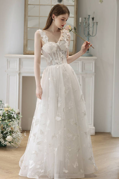 Robe longue corset évasée blanche à fleurs 3D